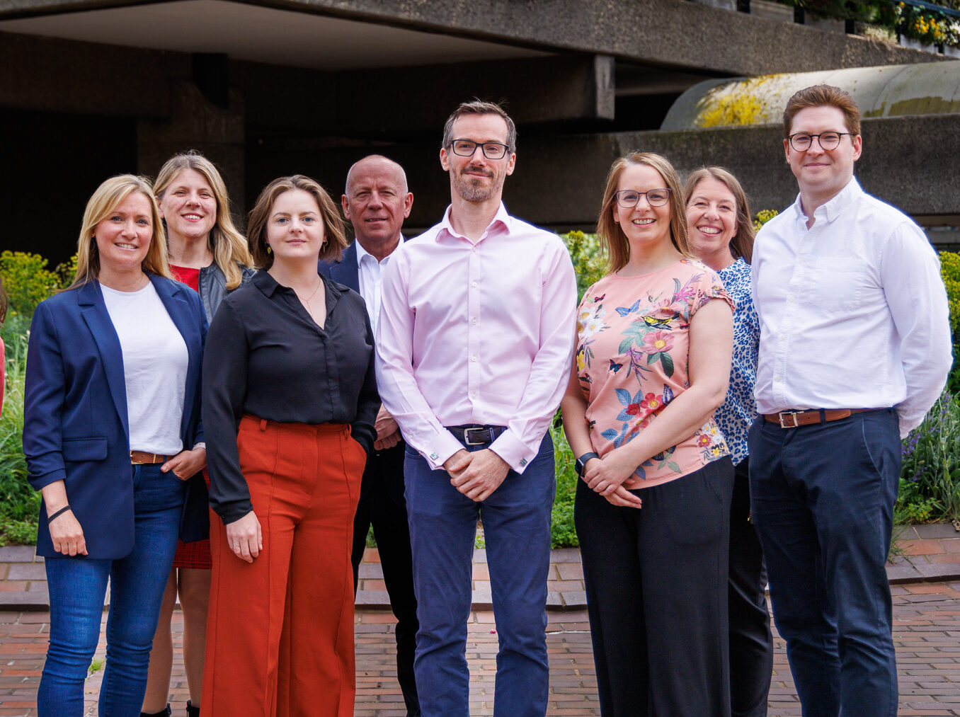 equantiis team members posing together for a group photo